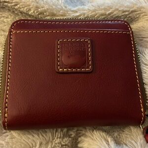 NWT. Dooney  and Bourke Florentine Small Zip Around Wallet in Bordeaux